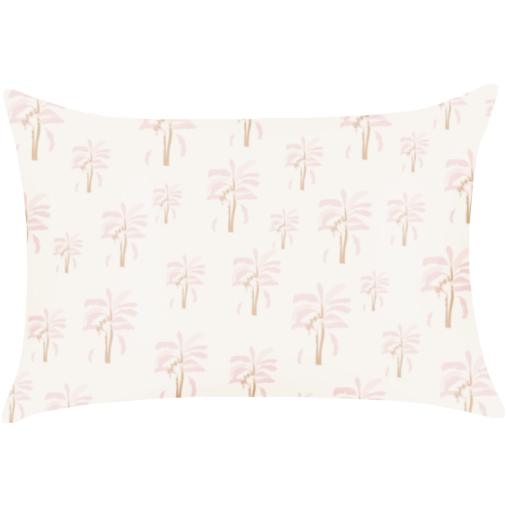 Pink Palm satin pillowcase featuring pale pink palm trees with golden orange trunks on a cream background.