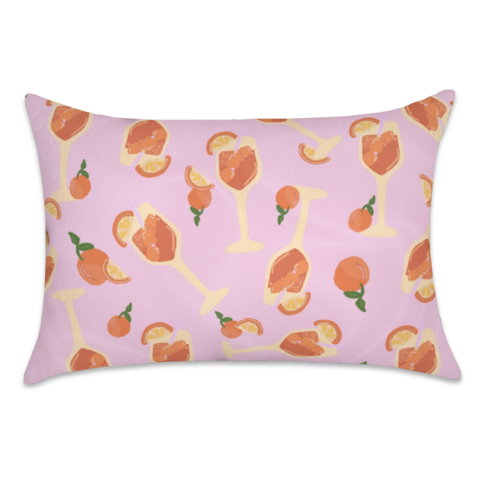 Aperol Spritz satin pillowcase featuring orange cocktails, orange slices, and green leaves on a pink background.