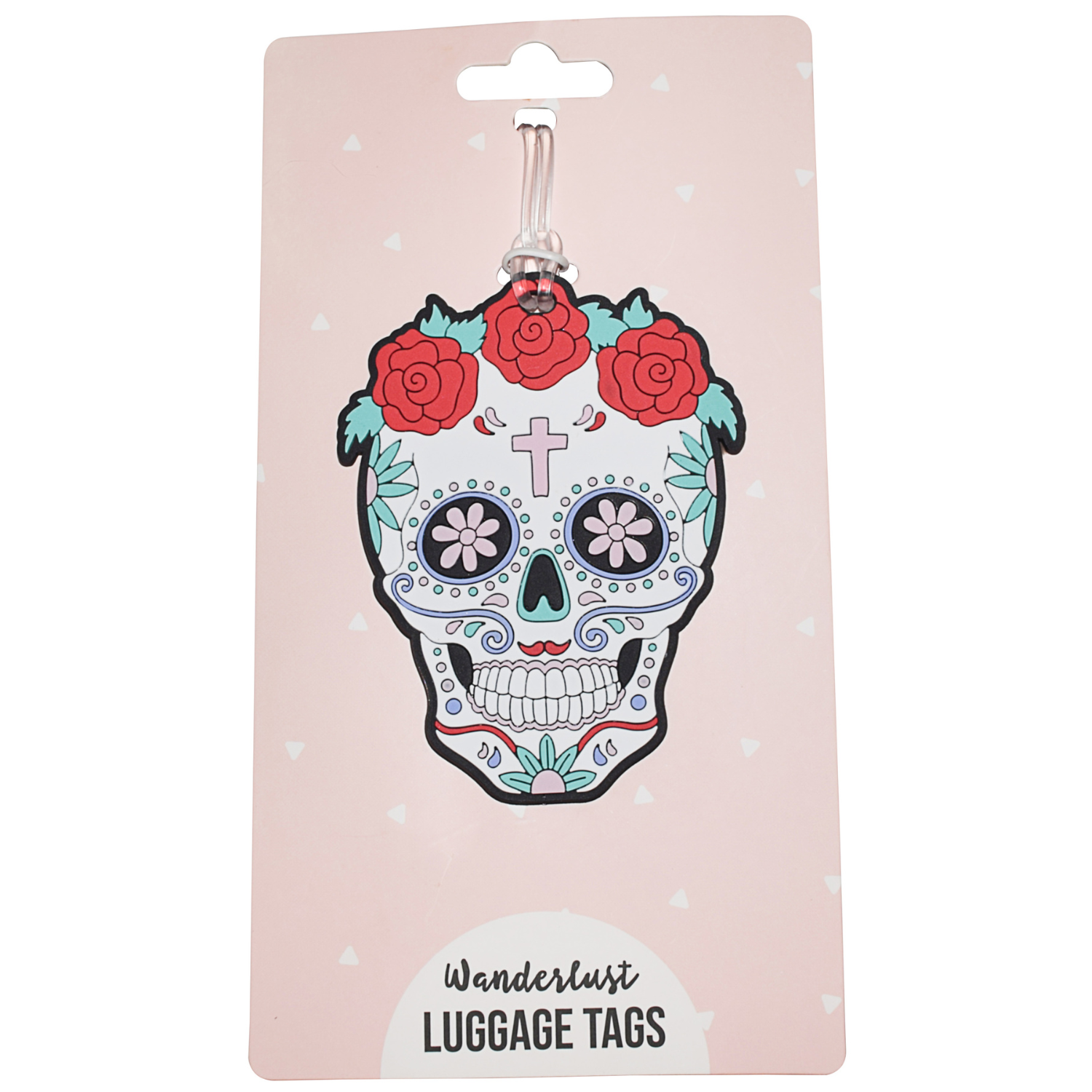 Floral sugar skull silicone luggage tag displayed on pink Wanderlust retail packaging