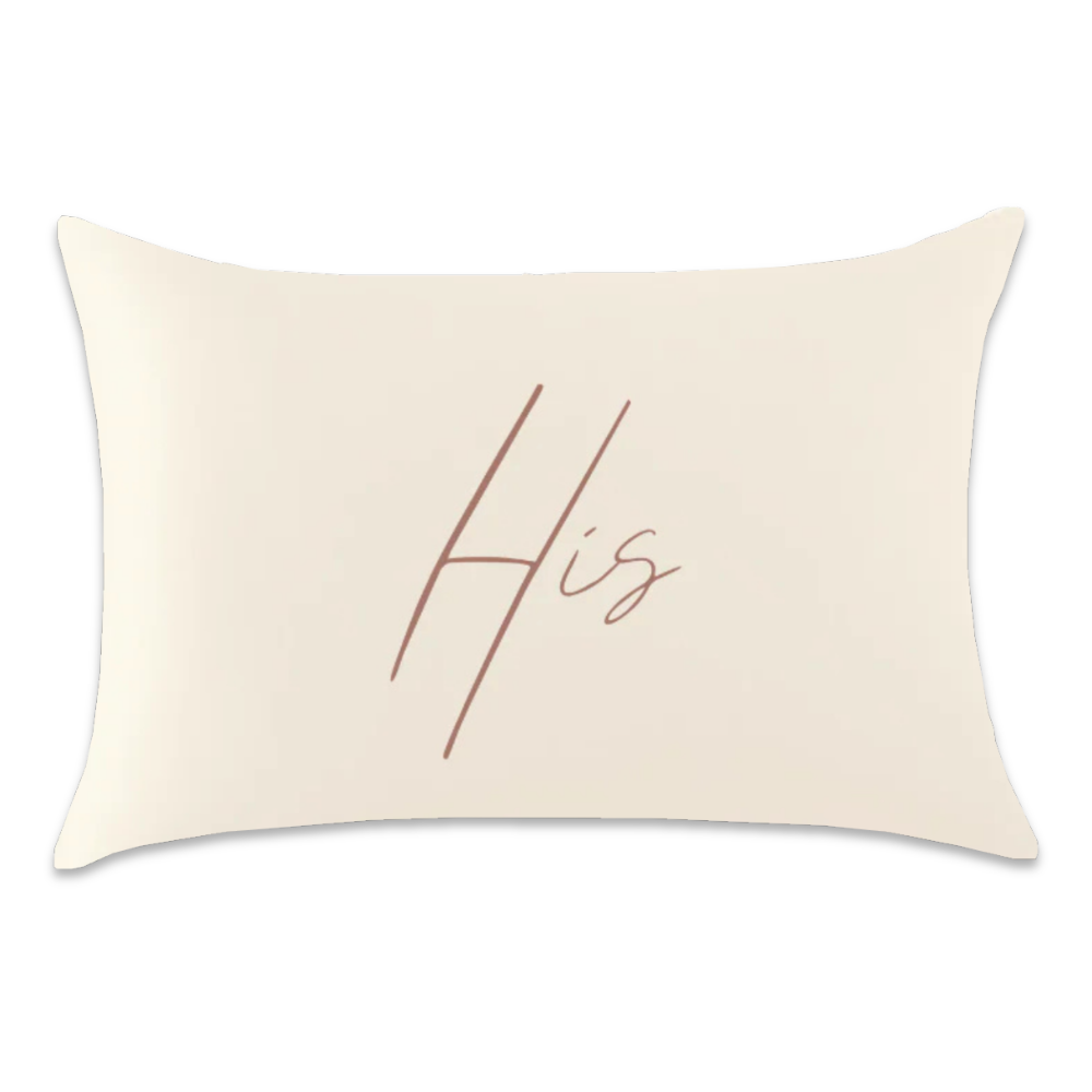Ivory satin pillowcase with “His” written in dusty rose script across the center.