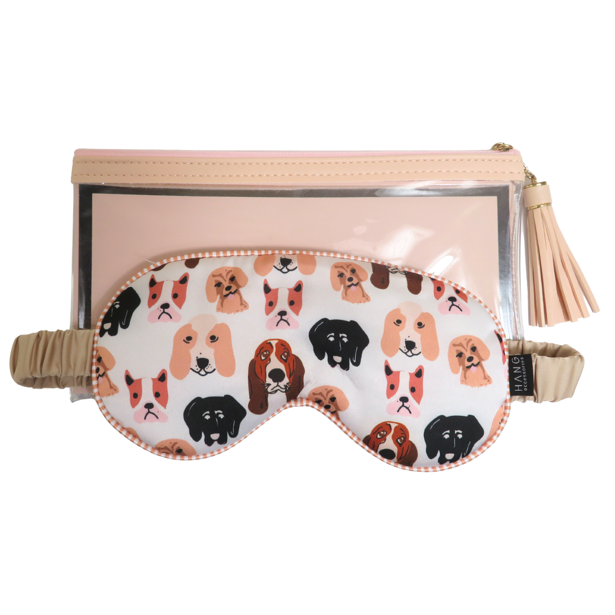 A travel pouch and matching sleep mask set. The pouch has a clear front window, a light blush leather-look trim, and a matching blush tassel zipper pull.