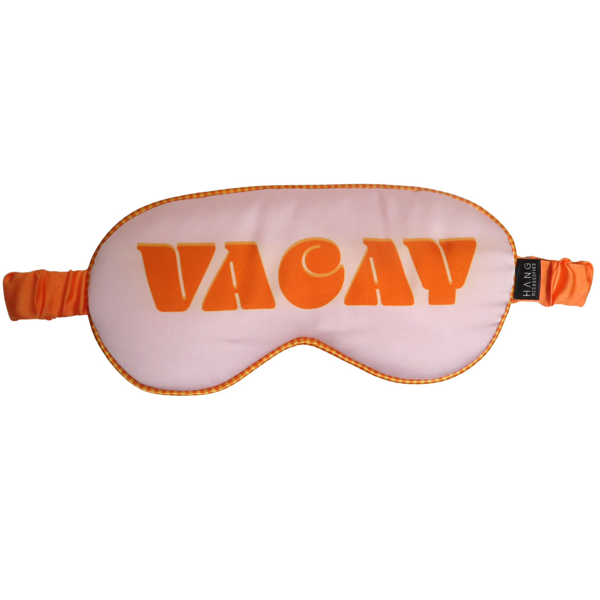 A white sleep mask with orange trim and the word &