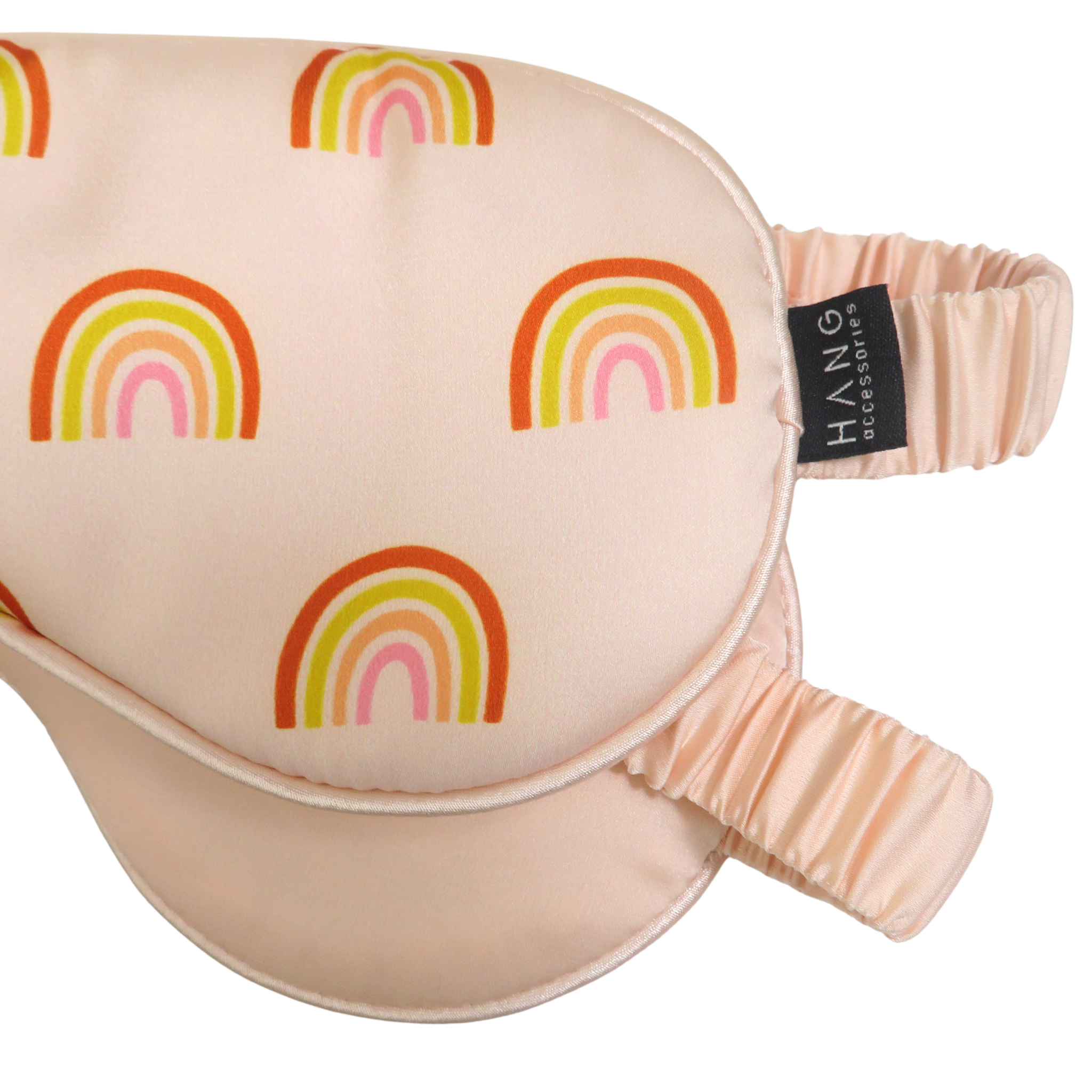Close-up of the colorful rainbow print and satin fabric